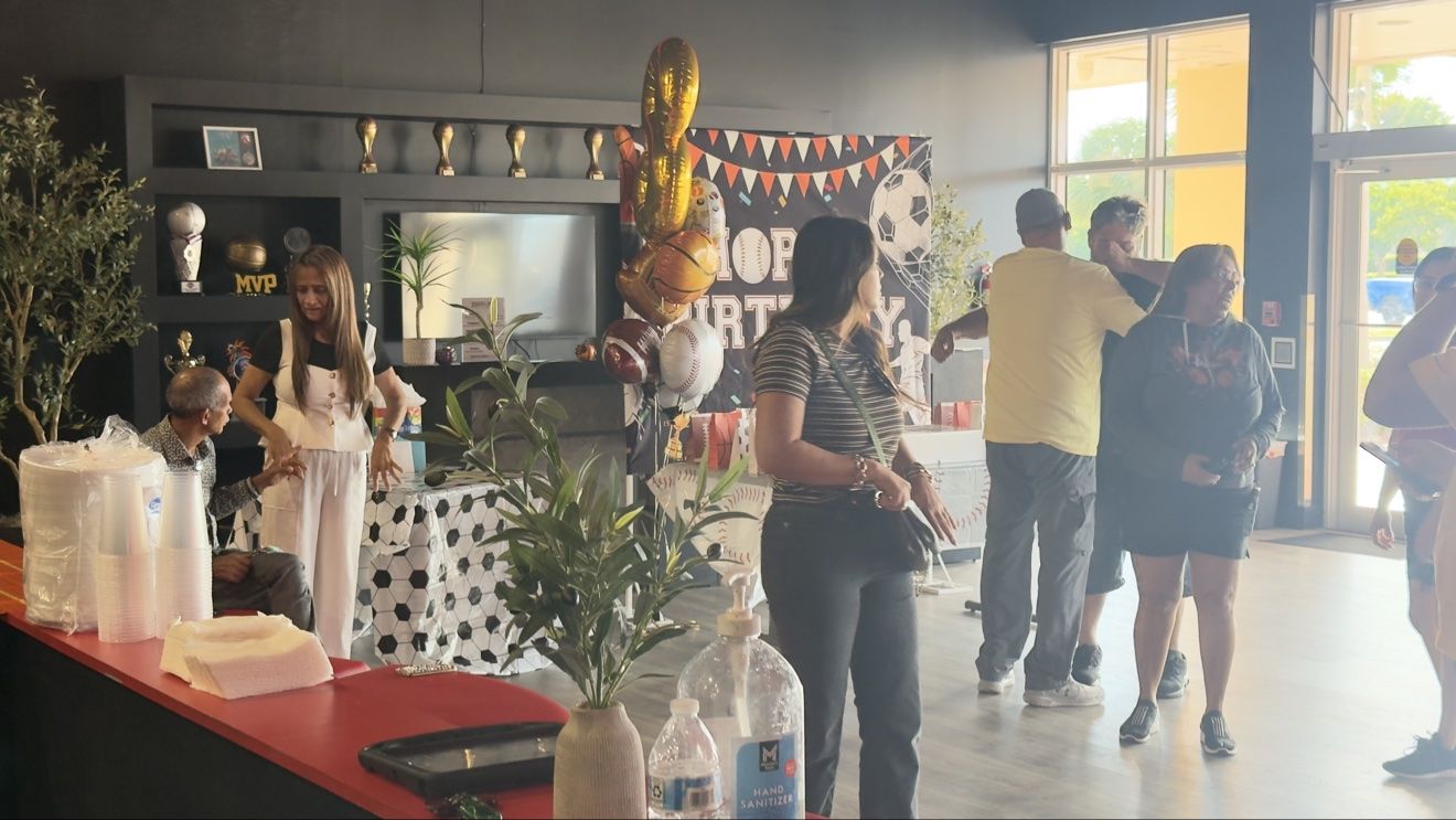 Families gathered in the Next Level lobby for a birthday party